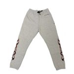 It looks like the Chrome Hearts Matty Boy Brain sweatpants are a specific style of sweatpants offered by the luxury fashion brand Chrome Hearts. It is likely that these sweatpants are made of high-quality materials and feature the Chrome Hearts logo and the "Matty Boy Brain" design on the leg or waistband. These sweatpants may be sold through Chrome Hearts retail stores or through high-end department stores and specialty boutiques. It is difficult to determine the price of these sweatpants without more information.
