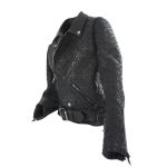 Track jackets are a type of outerwear that are often worn for casual, athletic, or leisure purposes. They are typically made of lightweight, breathable materials and have a relaxed, comfortable fit. Chrome Hearts is a high-end fashion brand known for its luxurious and edgy clothing and accessories. It is likely that the brand offers a range of track jackets in various styles and designs, made of high-quality materials and featuring the brand's signature aesthetic. Prices for Chrome Hearts track jackets may vary depending on the specific style and materials used, as well as other factors such as the location of the retailer. Is there anything else I can help you with