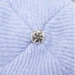 It is a Chrome Hearts Big Daddy Cashmere Beanie - Blue with the words "Chrome Hearts Big Daddy " embroidered on it. It is likely made from high-quality material, such as wool or cashmere, and features the Chrome Hearts logo.