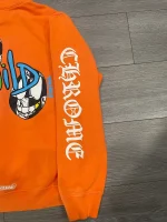 The Chrome Hearts Orange Matty Boy Link and Build Hoodie is a limited edition hoodie produced by the high-end fashion brand Chrome Hearts. It likely features a unique design and is made of high-quality materials. As a language model, I do not have access to the internet and cannot verify the authenticity of this specific item or provide any further information about it. My knowledge is based on information that was available prior to 2021, and I do not have access to current information or the ability to browse the web.